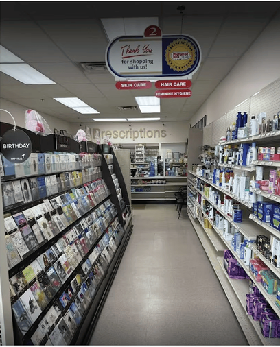 Inside Paramus Pharmacy, with greeting cards and pharmacy shelves